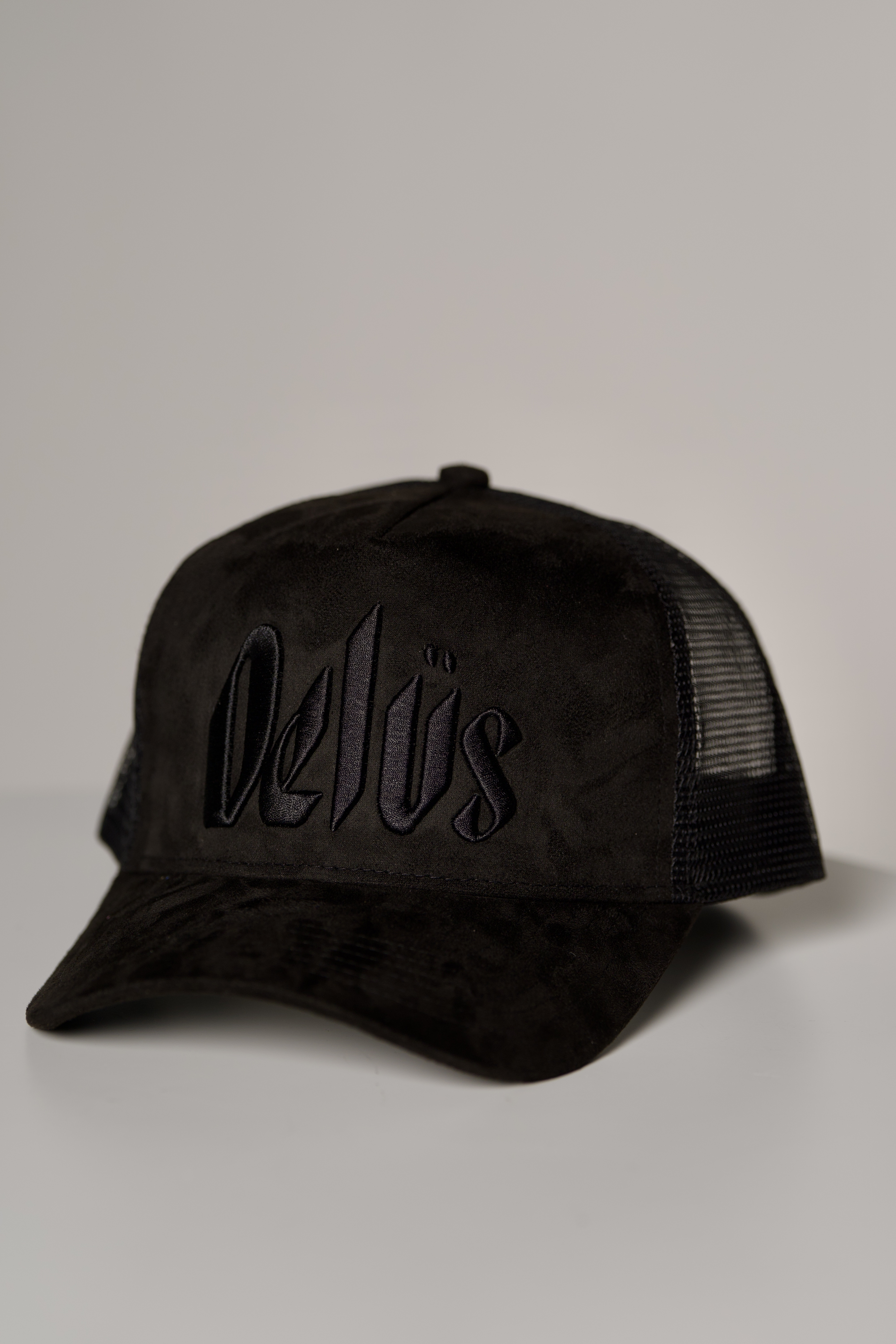 Delus Trucker Hat - Front